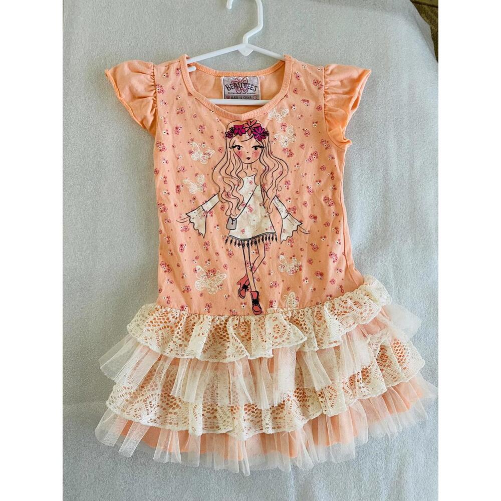 Beautees Girls Peach Dress with Ruffle Skirt and Graphic Print